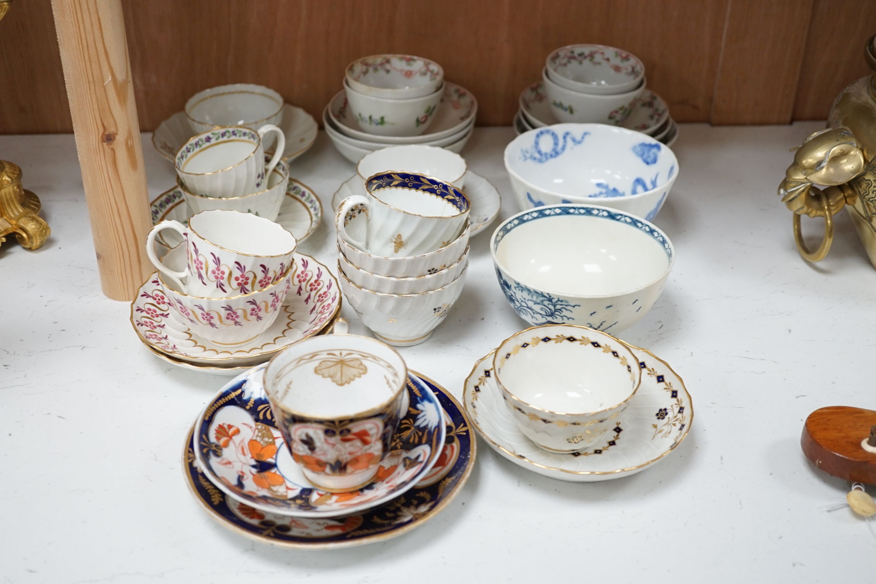 A selection of late 18th/early 19th century English porcelain tea and coffee wares including Worcester and New Hall types